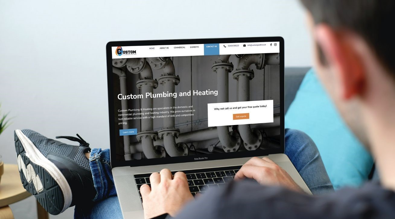 Custom Plumbing and Heating website on a laptop