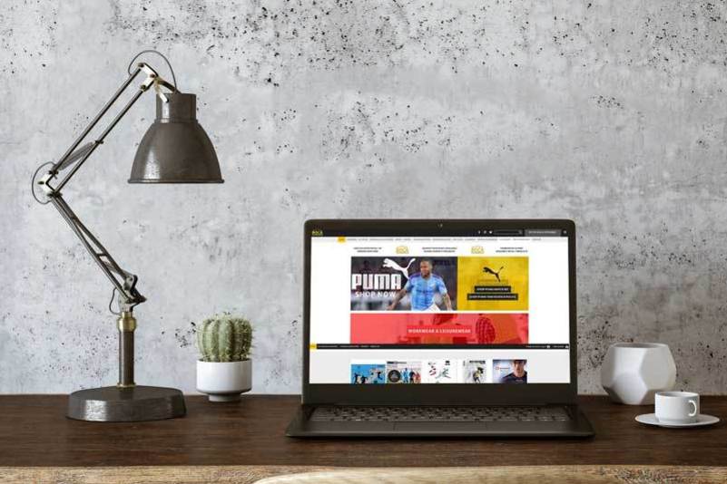 Boca Teamwear website on a laptop